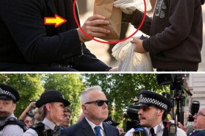 After months away from the public eye, Huw Edwards was spotted quietly helping a poor boy on a Cardiff sidewalk — but one small detail in the viral photo has everyone talking.